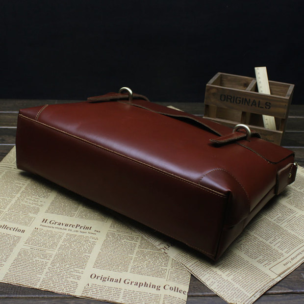 Brown vintage messenger bag base and corner wear points