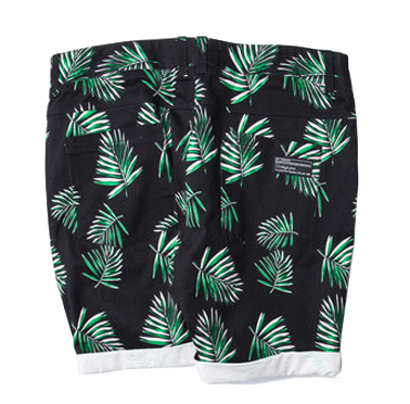 Green floral sweat shorts angled view showing drape