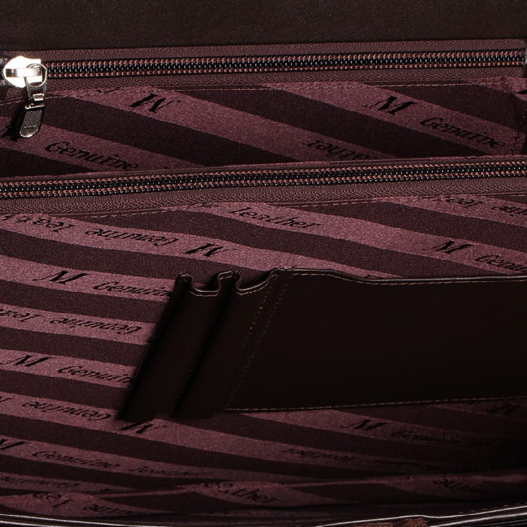 Brown crocodile briefcase hardware and closure detail
