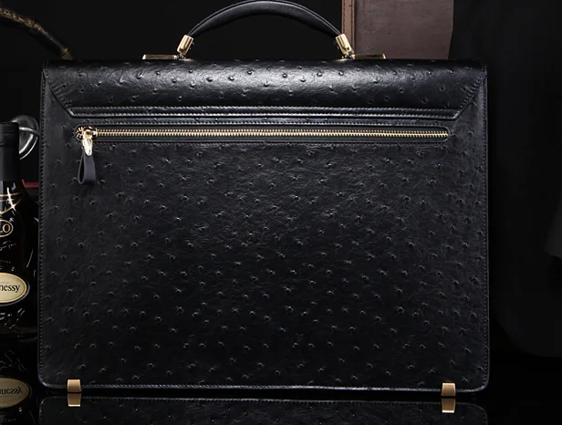 Ostrich grain briefcase angled view showing gusset depth