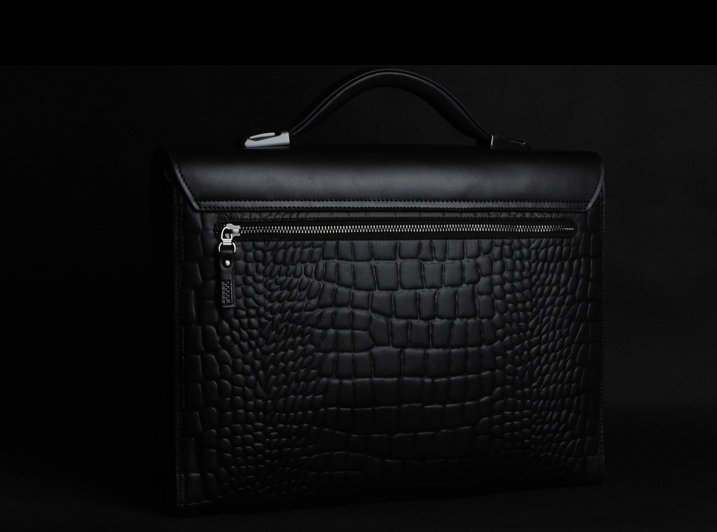 Black crocodile laptop bag angled view and closure detail